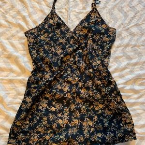 SHEIN navy romper with floral design